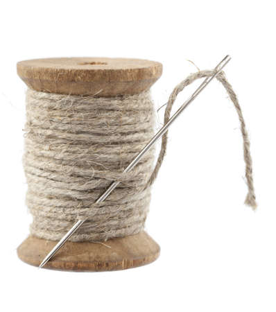 rope yarn on spool with big needle