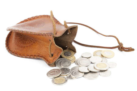 spilled coins with money-bag on white backgroundの写真素材