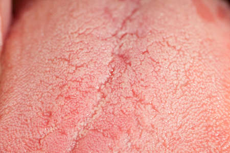 human tongue in centre man made macroの写真素材