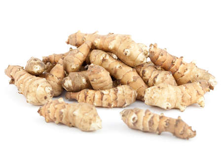 species edible tuber with root on whiteの写真素材
