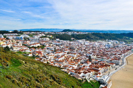 Aerial view of a resort town of Nazare in Portugalの写真素材
