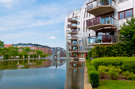 DEN BOSCH, NETHERLANDS - JULY 6, 2013: Modern Apartment Buildings in Den Bosch. Unique architecture residential buildings in a new nice neighborhood near to the central station.のeditorial素材