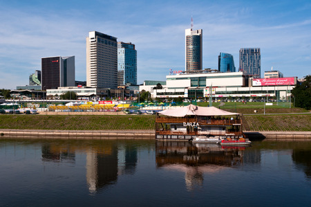 VILNIUS, LITHUANIA - AUGUST 6: New modern corporate buildings in Vilnius on August 6, 2013. Newly built business skyscrapers as seen from the other side of Neris river.のeditorial素材