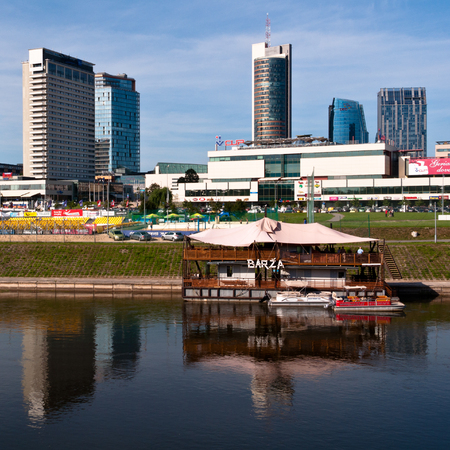 VILNIUS, LITHUANIA - AUGUST 6: New modern corporate buildings in Vilnius on August 6, 2013. Newly built business skyscrapers as seen from the other side of Neris river.のeditorial素材