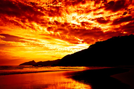 Save Download Preview Dramatic Tropical Sunset at Lopes Mendes Beach, Ilha Grande Island, Rio de Janeiro State, Brazilの写真素材