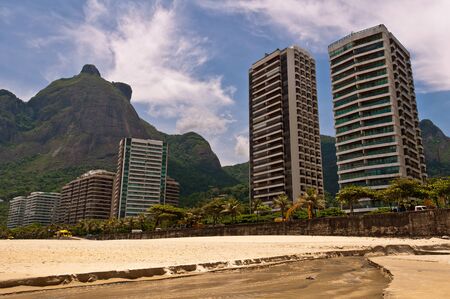 Beautiful Tropical Beach Landscape, Mountains, Luxury Buildings in Sao Conrado Beach, Rio de Janeiro