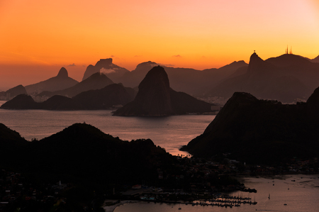 Beautiful View of Rio de Janeiro Mountains by Sunset from the City Park in Niteroi, Brazilの写真素材