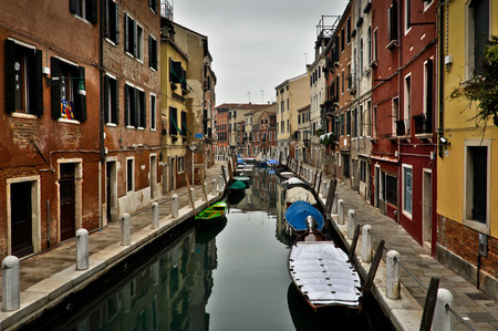 Beautiful View of Canal with Boats in Venice, Italyの写真素材