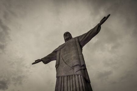 Rio de Janeiro, Brazil - January 19, 2012: Statue of Christ the Redeemer stands against cloudy sky.のeditorial素材