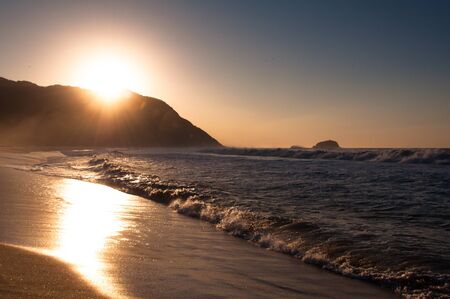 Sunrise in tropical Grumari Beach in Rio de Janeiro, Brazilの写真素材