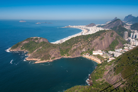 View of the South Zone of Rio de Janeiro with Copacabana Beach, Buildings, and Mountainsの写真素材
