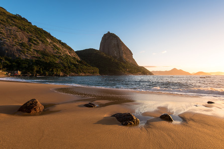 Sunrise in the Beach with the Sugarloaf Mountain, Rio de Janeiro, Brazilの写真素材