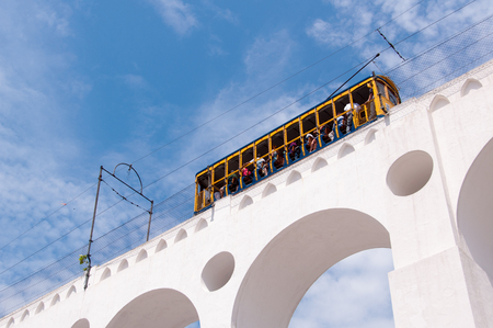 Iconic Tram of Santa Teresa is Crossing the Arch of Lapa in Rio de Janeiro, Brazilの写真素材