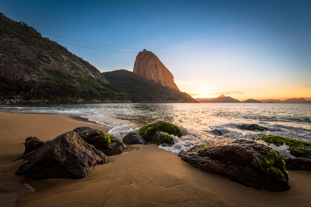 Beautiful Sunrise in the Red Beach (Praia Vermelha) with the Sugarloaf Mountain, Rio de Janeiro, Brazilの写真素材