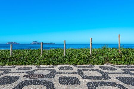 Famous Ipanema Sidewalk Mosaic and Ocean in the Horizon, Rio de Janeiro, Brazilの写真素材