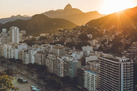 Sunset View in Copacabana, Apartment Buildings, Favela Babilonia, Mountains, and Corcovadoのeditorial素材