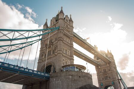 Famous landmark of the city - Tower Bridge - as seen from the boat passing underの写真素材
