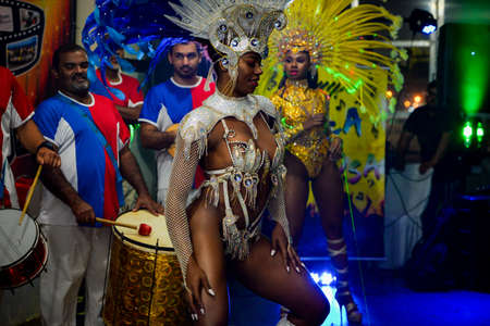 Rio de Janeiro, Brazil - June 5, 2019: Pretty samba dancer performing in a carnival block party at night.のeditorial素材