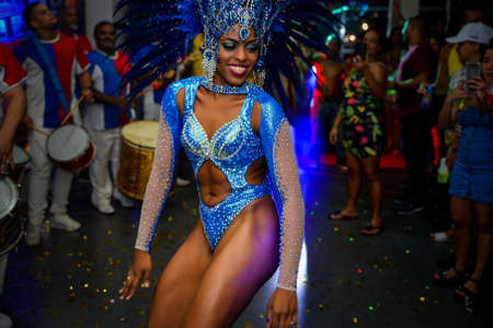 Rio de Janeiro, Brazil - June 5, 2019: Pretty samba dancer performing in a carnival block party at night.のeditorial素材
