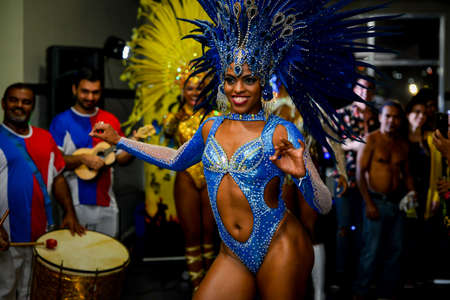 Rio de Janeiro, Brazil - June 5, 2019: Pretty samba dancer performing in a carnival block party at night.のeditorial素材
