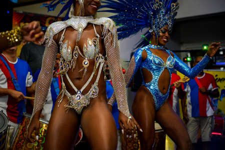 Rio de Janeiro, Brazil - June 5, 2019: Pretty samba dancer performing in a carnival block party at night.のeditorial素材