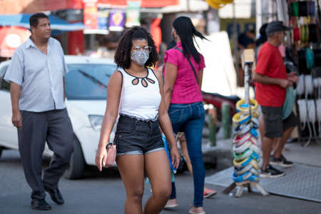 Rio de Janeiro, Brazil - July 3, 2020: Only some people are wearing face masks during the Coronavirus pandemic in suburban area of the city.のeditorial素材