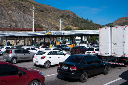 Rio de Janeiro, Brazil - August 5, 2020: Highway traffic jam on pay toll station of the Yellow Line (Linha Amarela).のeditorial素材