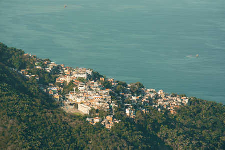 Brazilian Favela on the Hill With Beautiful Ocean View in Rio de Janeiro, Brazilの写真素材