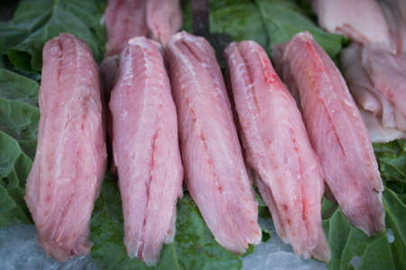 Fresh Fish Fillet Slices at the Marketの写真素材