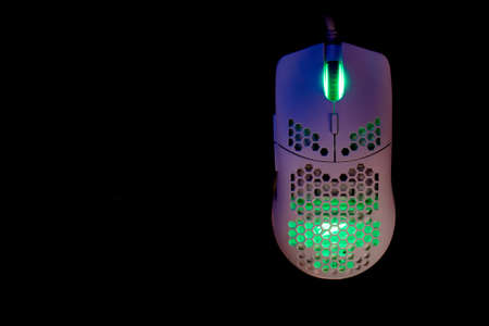 White Gaming Mouse With Led Lights on Black Backgroundの写真素材