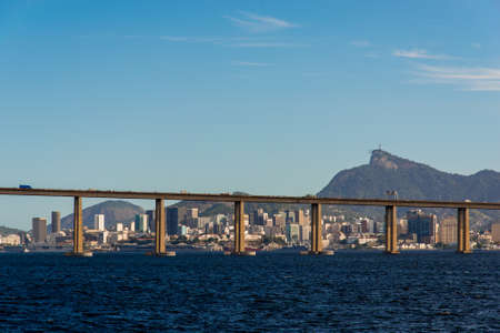 Rio - Niteroi Bridge Crossing Guanabara Bay and Rio de Janeiro City Behind With the Corcovado Mountainの写真素材