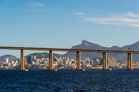 Rio - Niteroi Bridge Crossing Guanabara Bay and Rio de Janeiro City Behind With the Corcovado Mountainの写真素材