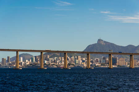 Rio - Niteroi Bridge Crossing Guanabara Bay and Rio de Janeiro City Behind With the Corcovado Mountainの写真素材