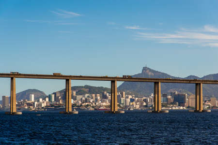 Rio - Niteroi Bridge Crossing Guanabara Bay and Rio de Janeiro City Behind With the Corcovado Mountainの写真素材