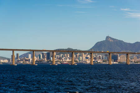 Rio - Niteroi Bridge Crossing Guanabara Bay and Rio de Janeiro City Behind With the Corcovado Mountainの写真素材