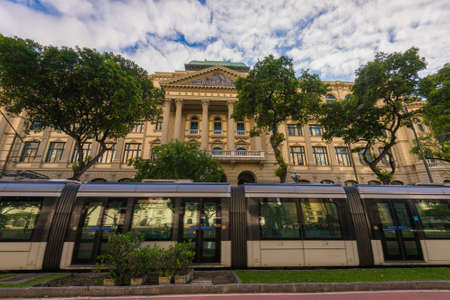 Rio de Janeiro, Brazil - October 26, 2021: VLT passenger tram passing in front of the National Library building.のeditorial素材