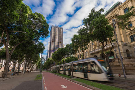 Rio de Janeiro, Brazil - October 26, 2021: Modern VLT passenger tram passes in Rio Branco avenue in the city center.のeditorial素材