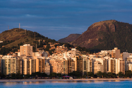Buildings in Front of Icarai Beach in Niteroi, Brazil With Hills in the Horizonの写真素材