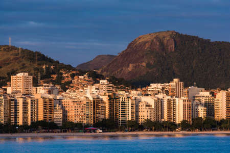 Buildings in Front of Icarai Beach in Niteroi, Brazil With Hills in the Horizonの写真素材