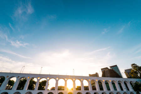 Sun Shines Through Landmark Lapa Arches in Rio de Janeiro City Downtownの写真素材