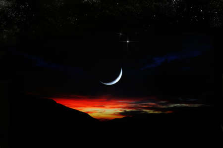 moon sunset full of coloursの写真素材