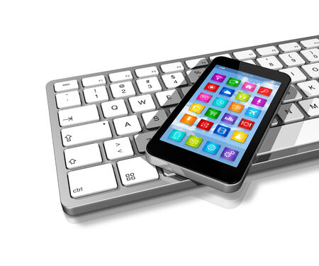3D Smartphone on Computer Keyboardの写真素材