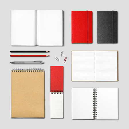 stationery books and notebooks mockup template isolated on grey backgroundの写真素材