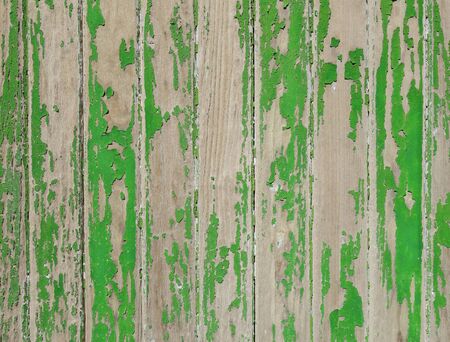 Old wood board painted green, background textureの写真素材