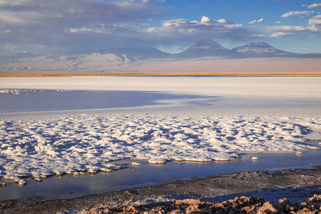 Laguna Tebinquinche sunset landscape in San Pedro de Atacama, Chileの写真素材
