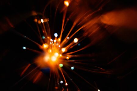 Colorful light explosion on black background. Futuristic wallpaperの写真素材