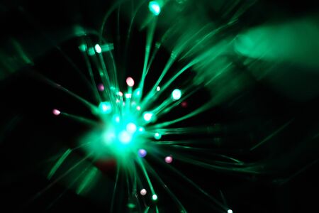 Colorful light explosion on black background. Futuristic wallpaperの写真素材