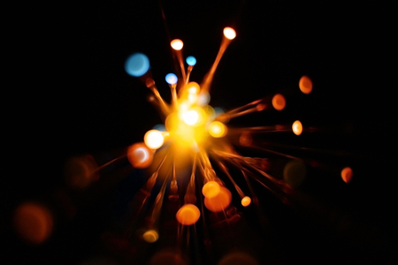 Colorful light explosion on black background. Futuristic wallpaperの写真素材