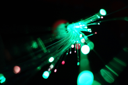 Colorful light explosion on black background. Futuristic wallpaperの写真素材