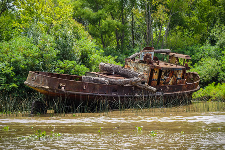 Old rusty boat on the Tigre river Delta. Buenos Airesの写真素材